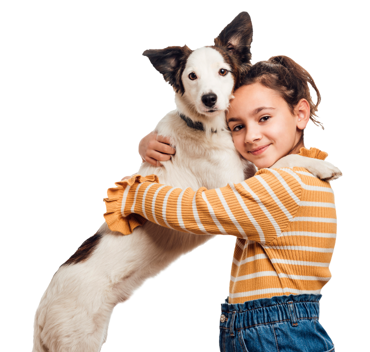 Girl and her dog hugging